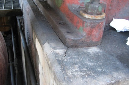 Cracked foundation causing vibration and equipment reliability problems.